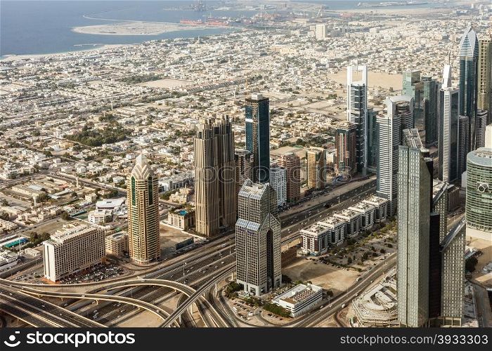 Downtown Dubai. Skyscrapers and road. The Buildings In The Emirate Of Dubai