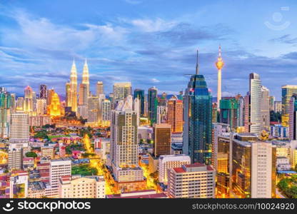 Downtown Kuala Lumpur skyline at twilight in Malaysia