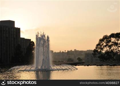 Downtown Los Angeles plaza fountain at sunset
