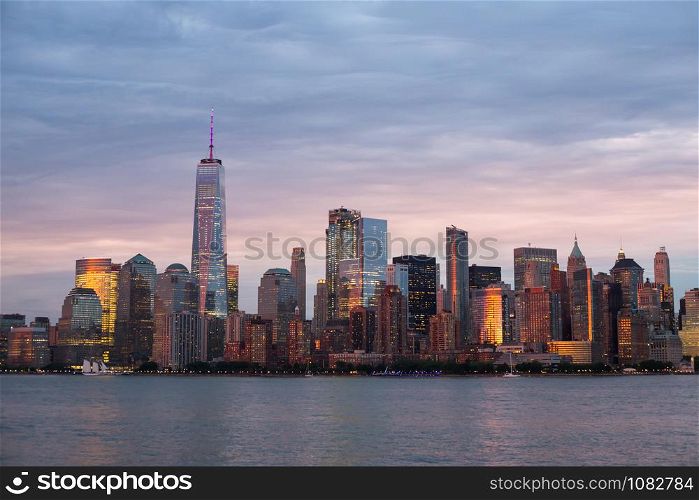 Downtown manhattan new york jersey city golden hour sunset.