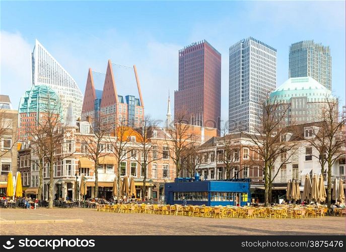 Downtown of The Hague Netherlands, with its monumental old buildings, and modern skyline in the background