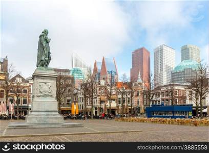 Downtown of The Hague Netherlands, with its monumental old buildings, and modern skyline in the background
