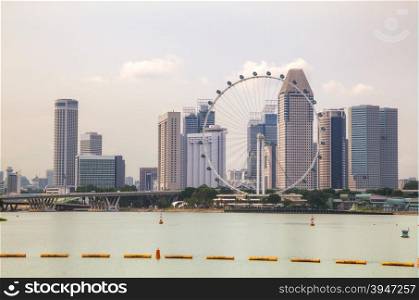 Downtown Singapore as seen from the Marina Bay in the evening
