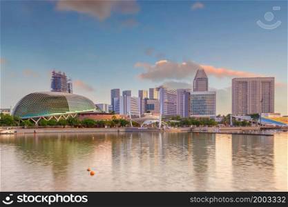 Downtown Singapore city skyline. Cityscape of business district area at twilight