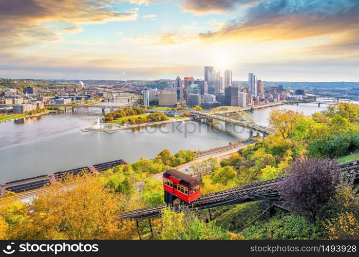 Downtown skyline and vintage incline in Pittsburgh, Pennsylvania, USA at sunset