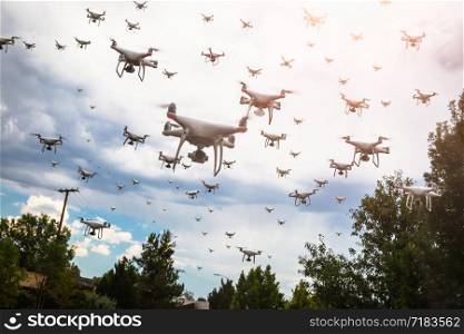 Dozens of Drones Swarm in the Cloudy Sky.