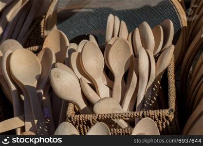 dozens of soup spoon or tablespoon made of wood