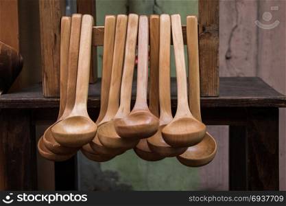 dozens of soup spoon or tablespoon made of wood