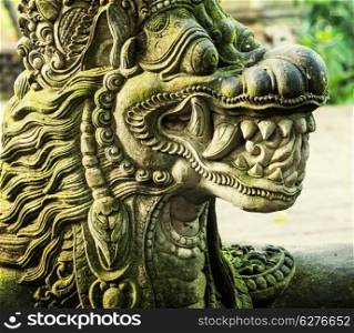 Dragon statue in Monkey Forest Sanctuary in Bali, Indonesia.