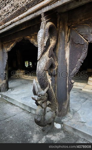 Dragon wooden carving at Shwenandaw Kyaung Temple in Mandalay, Myanmar