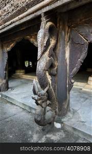 Dragon wooden carving at Shwenandaw Kyaung Temple in Mandalay, Myanmar