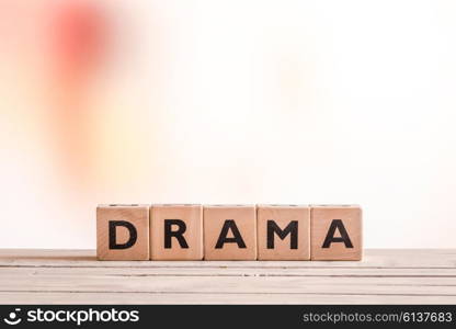 Drama sign created with cubes on a table