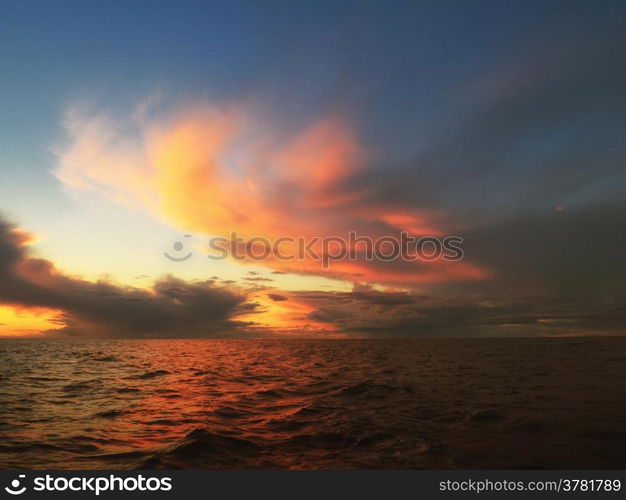 Dramatic beatiful sunset with clouds over the Baltic sea