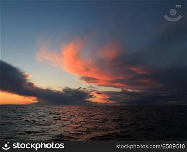 Dramatic beatiful sunset with clouds over the Baltic sea