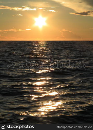 Dramatic beatiful sunset with clouds over the Baltic sea