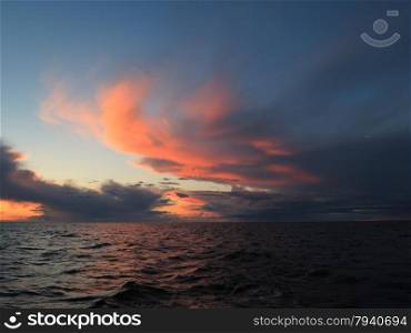 Dramatic beatiful sunset with clouds over the Baltic sea