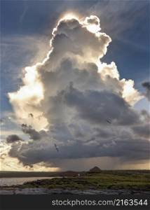 Dramatic cloud - Cumulonimbus thunder cloud over South Plaza Island in The Galapagos Islands