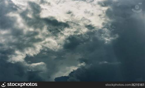 Dramatic clouds on dark stormy sky. Heaven background. Epic cloudscape, thunderstorm backdrop. Sinister element. High quality photo. Dramatic clouds on dark stormy sky. Heaven background. Epic cloudscape, thunderstorm backdrop. Sinister element