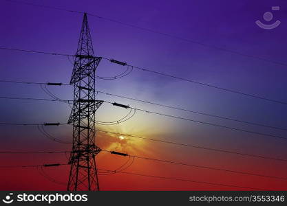 Dramatic clouds sky and electric tower backlight silhouette