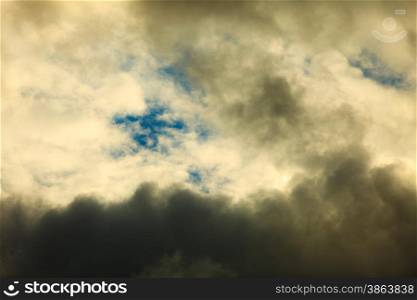 Dramatic cloudscape. Dark stormy clouds covering the sky as nature background. Meteorology.