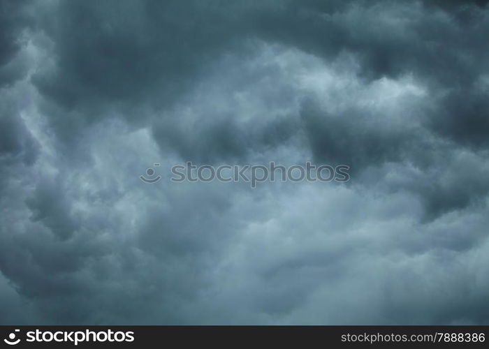 Dramatic cloudscape. Dark stormy clouds covering the sky as nature background. Meteorology.