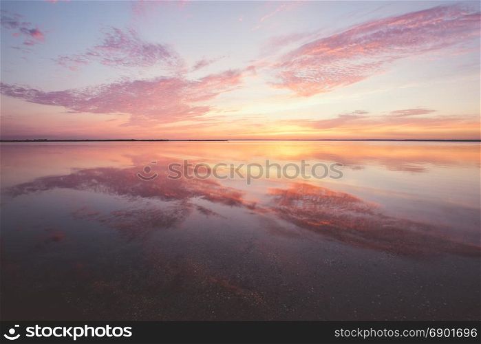 Dramatic colorful sunset over the lake