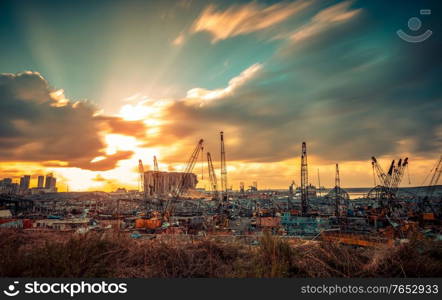 Dramatic Landscape of Ruins After Beirut Explosion. Beautiful Orange Sunset over the Rubble after a Terrible Disaster Blast in Lebanon.