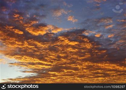 Dramatic orange sunrise sky, natural beautiful sky background