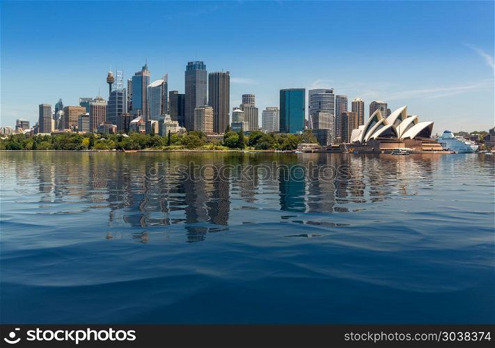 Dramatic panoramic photo Sydney harbor. Dramatic widescreen panoramic image of the city of Sydney from Taronga Zoo with artificial water in the harbour. Dramatic panoramic photo Sydney harbor
