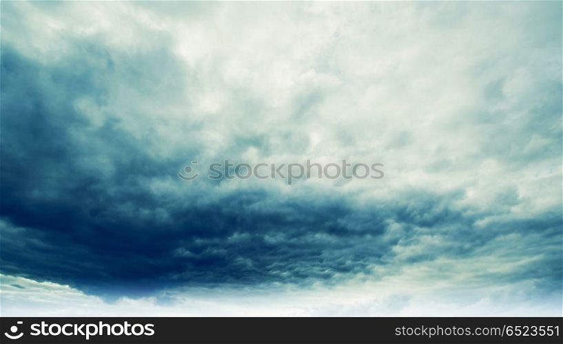 Dramatic rainy sky and dark clouds. Dramatic rainy sky and dark clouds. Hurricane wind. Dramatic rainy sky and dark clouds