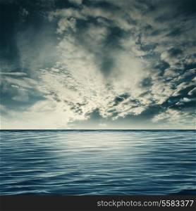 Dramatic sea, natural landscape with clouds and sea surface