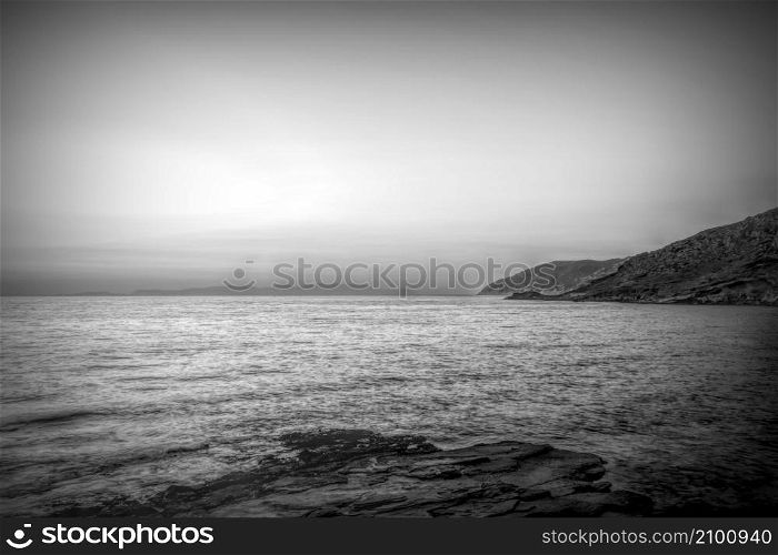 Dramatic seascape behind Kythera island. Natural beauty in an idyllic Greek island. Black and white photo.. Dramatic seascape behind Kythera island. Natural beauty in an idyllic Greek island