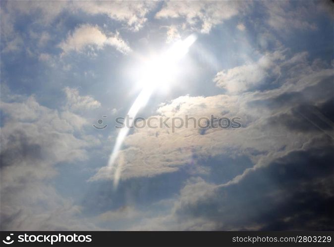 Dramatic sky and rays falling through the clouds