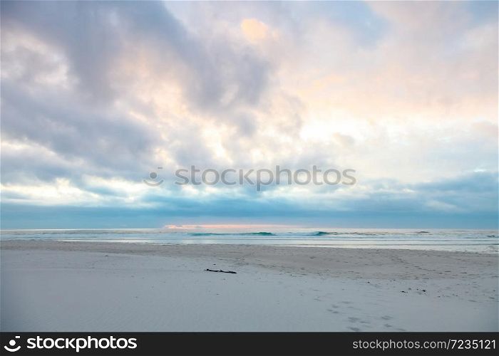 Dramatic sky at sunset on Noordhoek Beach in Cape Town South Africa
