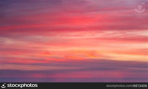 Dramatic sunset clouds in sky. Sunset sky with red clouds