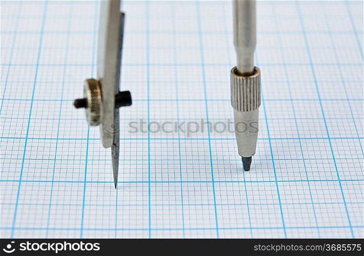 Drawing compass on graph paper
