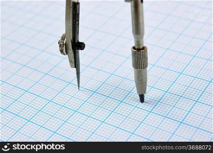 Drawing compass on graph paper