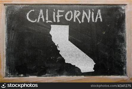 drawing of american state of california on chalkboard, drawn by chalk