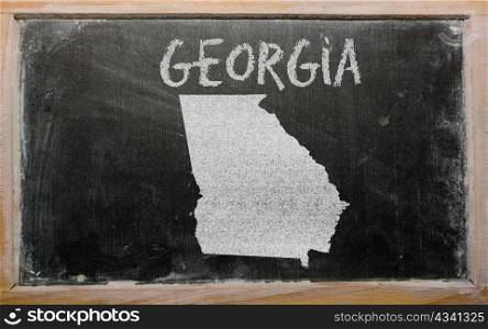 drawing of american state of georgia on chalkboard, drawn by chalk