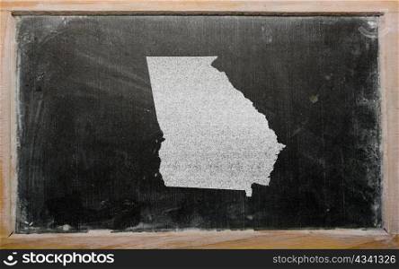 drawing of american state of georgia on chalkboard, drawn by chalk