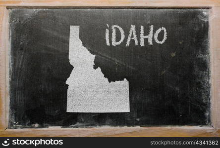 drawing of american state of idaho on chalkboard, drawn by chalk