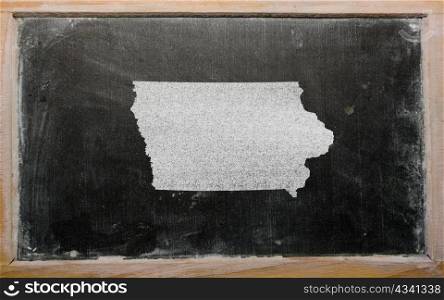 drawing of american state of iowa on chalkboard, drawn by chalk