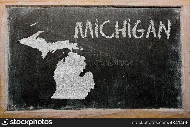 drawing of american state of michigan on chalkboard, drawn by chalk