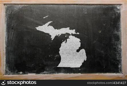 drawing of american state of michigan on chalkboard, drawn by chalk