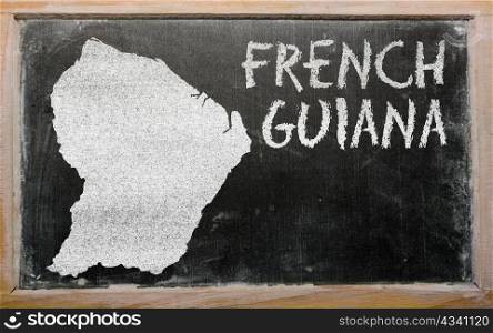 drawing of french guiana on blackboard, drawn by chalk