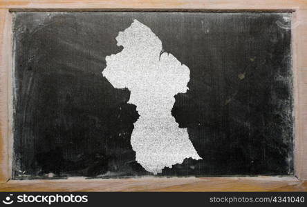 drawing of guyana on blackboard, drawn by chalk