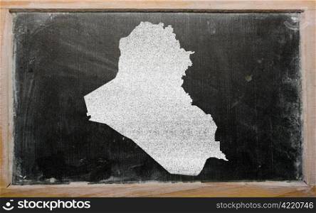 drawing of iraq on blackboard, drawn by chalk