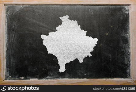 drawing of kosovo on chalkboard, drawn by chalk