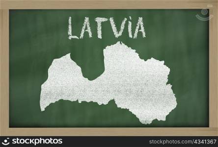 drawing of latvia on chalkboard, drawn by chalk