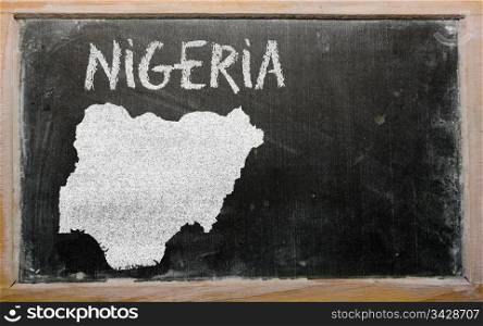 drawing of nigeria on blackboard, drawn by chalk